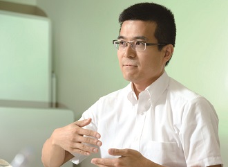 研究者の写真：有賀敏典